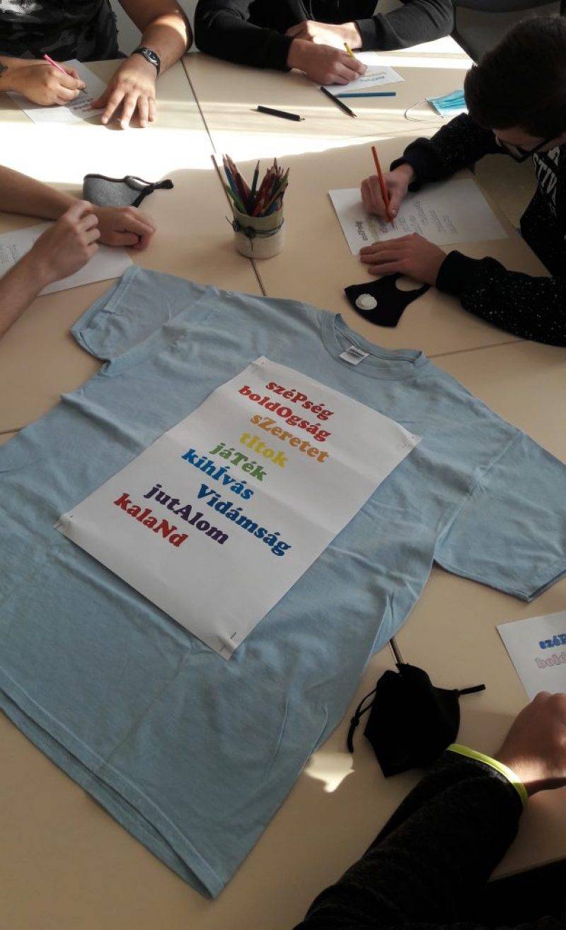 10.e-Optimista-póló.jpg 10.e-Optimista-póló.jpg